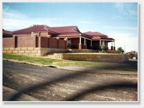 Residential limestone block retaining